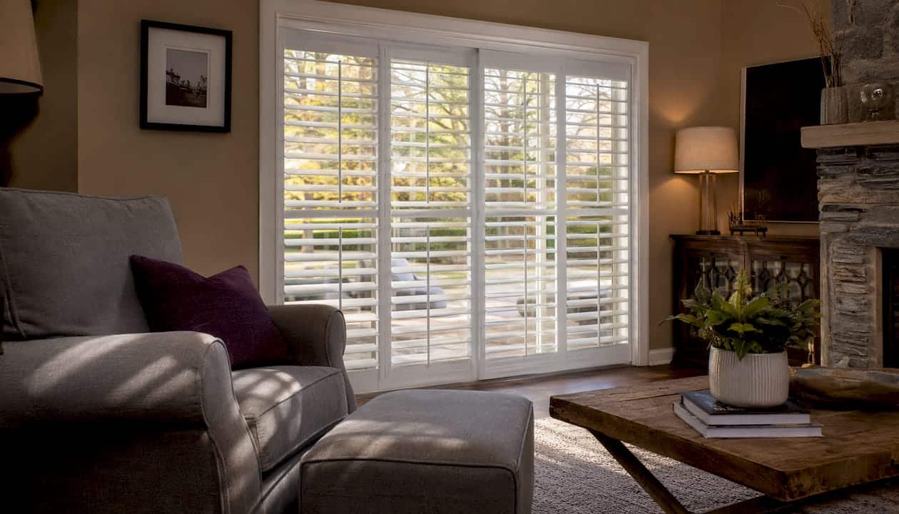 Living room with plantation shutters by window
